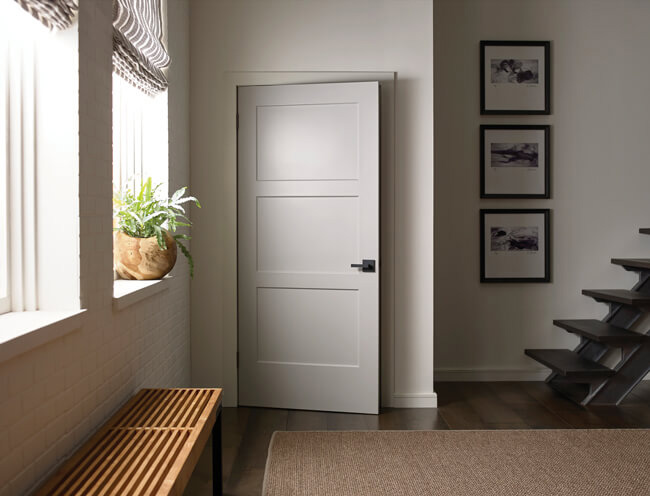 Chelsea beveled Shaker interior door in a finished room